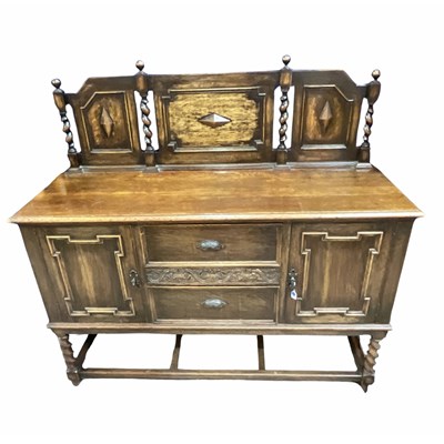 Lot 866 - An oak Jacobean revival sideboard with two...