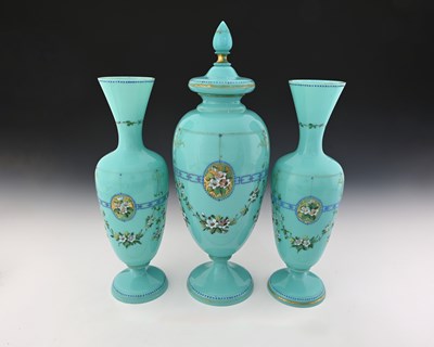 Lot 480 - A garniture of three Bohemian enamelled...