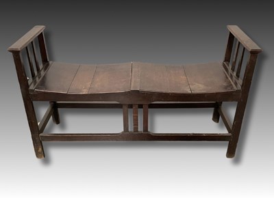 Lot 916 - An Arts and Crafts oak window bench, 61 high,...