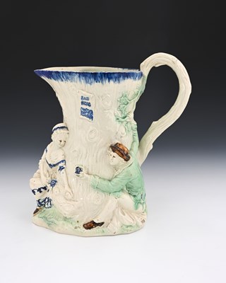 Lot 747 - A Staffordshire relief moulded jug, circa 1788,...