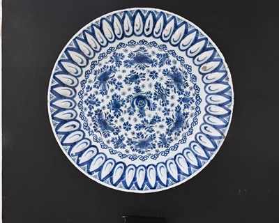 Lot 750 - A London Delft blue and white dish, fluted...