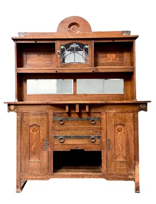 Lot 850 - An Arts and Crafts oak sideboard, Shapland and...