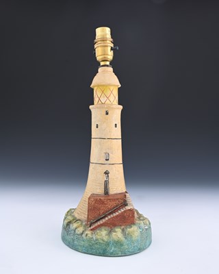 Lot 562 - Compton Pottery, a lighthouse lamp base,...