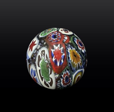 Lot 271 - A millefiori glass paperweight, likely Murano,...