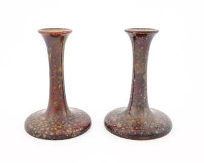 Lot 606 - Ruskin Pottery, a pair of candlesticks, 1924,...