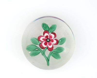 Lot 449 - A 19th century primrose glass paperweight, the...