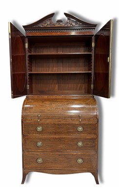 Lot 235 - An Edwardian mahogany cylinder bureau bookcase,...