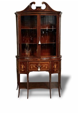 Lot 233 - An Edwardian mahogany bow-fronted vitrine,...