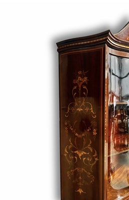 Lot 233 - An Edwardian mahogany bow-fronted vitrine,...