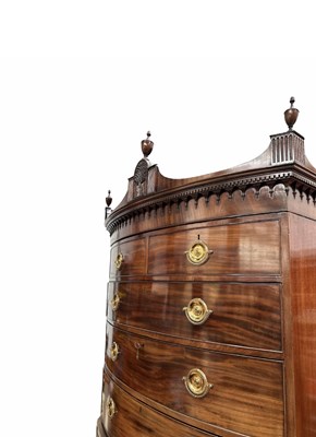 Lot 232 - A George III flame mahogany bow-fronted chest...
