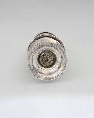Lot 298 - An unascribed silver-coloured metal caster, of...