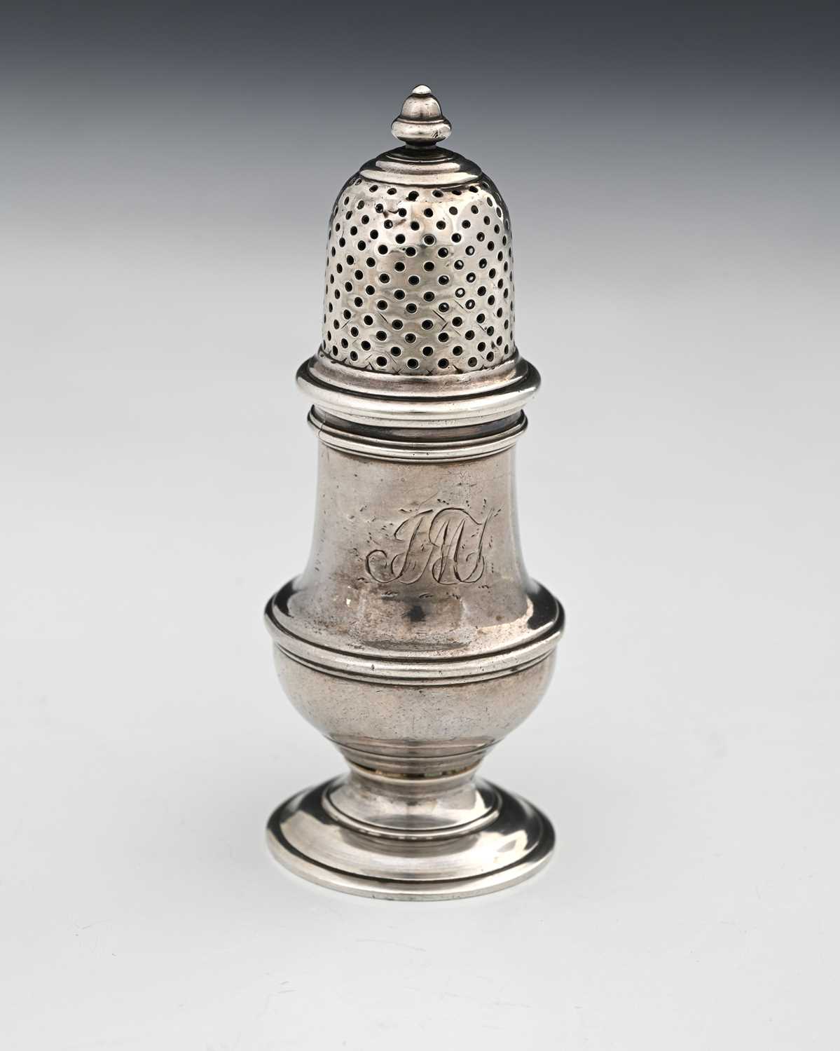 Lot 298 - An unascribed silver-coloured metal caster, of...
