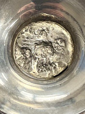 Lot 298 - An unascribed silver-coloured metal caster, of...