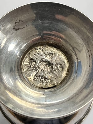 Lot 298 - An unascribed silver-coloured metal caster, of...
