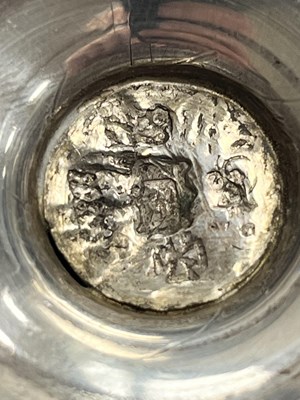 Lot 298 - An unascribed silver-coloured metal caster, of...
