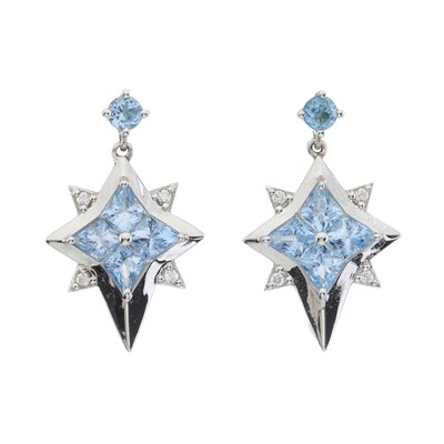 Lot 33 - A pair of 18ct gold blue topaz and diamond star drop earrings