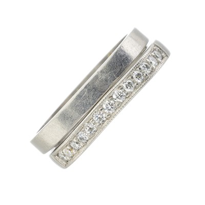 Lot 213 - Two platinum and diamond half eternity rings