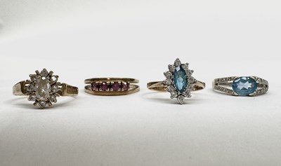 Lot 614 - Four gold gem-set rings