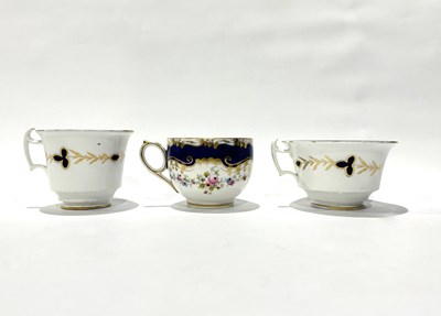 Lot 256 - Three 19th century tea cups decorated with...