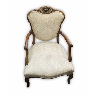 Lot 938 - A country style upholstered armchair with a...