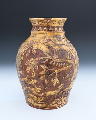Lot 757 - An English slipware jug, sgraffito decorated...