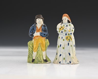 Lot 761 - A pair of miniature Staffordshire pearlware...