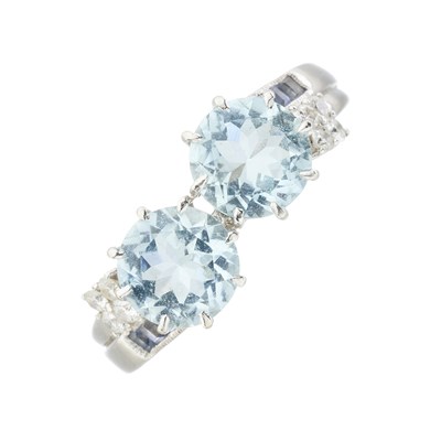 Lot 182 - An 18ct gold aquamarine, diamond and tanzanite dress ring