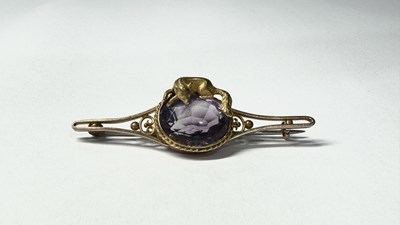 Lot 646 - An early 20th century 9ct gold amethyst fox brooch