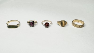 Lot 611 - A selection of five gold gem-set rings