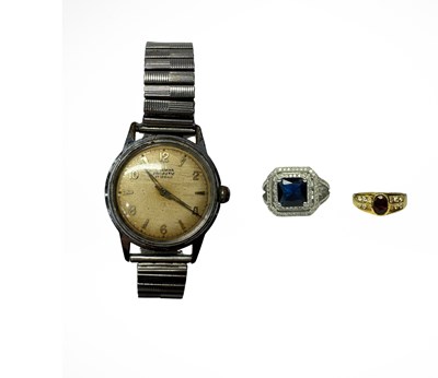 Lot 601 - Junghans, a vintage Trilastic wrist watch and two rings