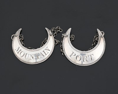 Lot 168 - A pair of George III silver crescent shape...