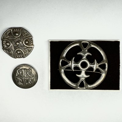 Lot 635 - Three silver brooches