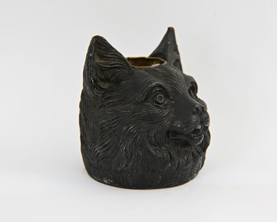 Lot 250 - A novelty patinated metal inkwell cast in the...
