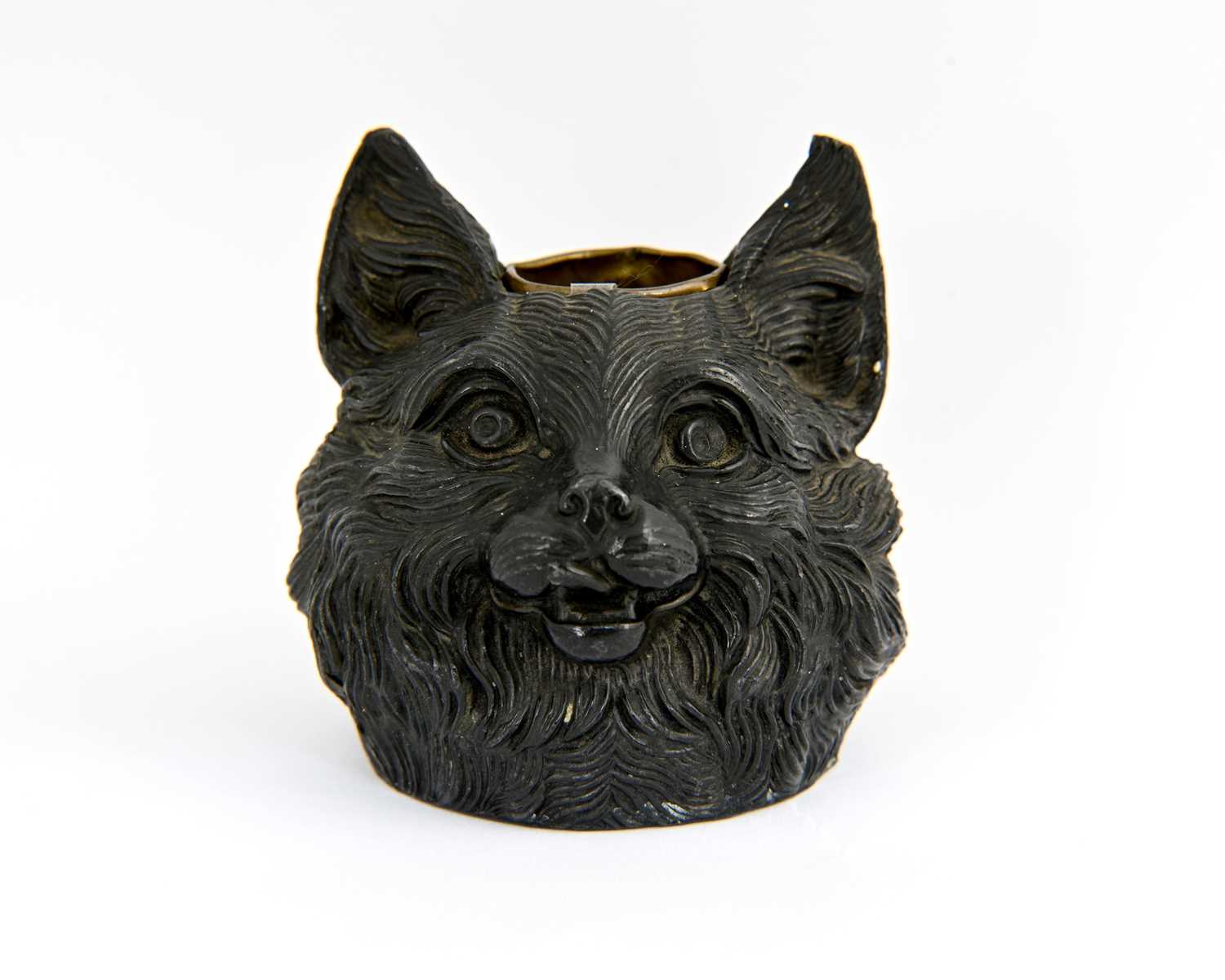 Lot 250 - A novelty patinated metal inkwell cast in the...