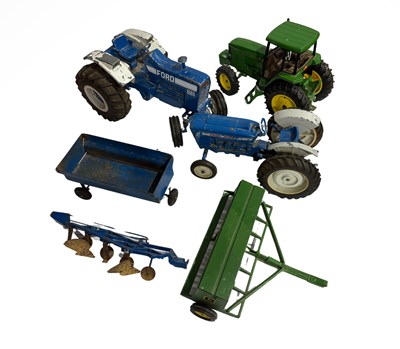 Lot 156 - Toys: Two mid-20th century Ford tractors with...