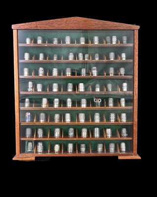 Lot 173 - A collection of sixty-seven thimbles, early...