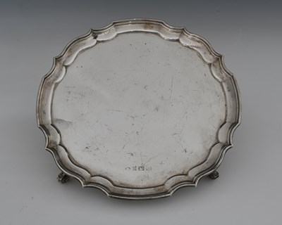 Lot 74 - An Elizabeth II silver salver, modelled after...