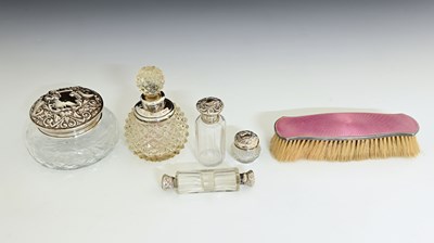 Lot 284 - A group of five glass dressing table bottles...