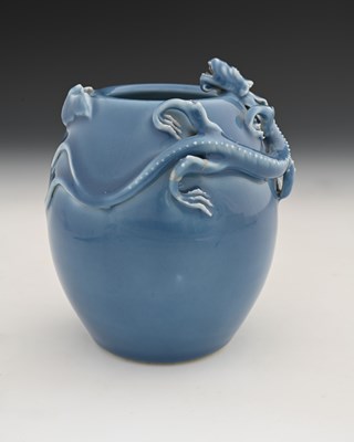 Lot 407 - A Chinese Clair de Lune relief moulded dragon...