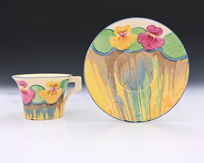 Lot 564a - Clarice Cliff, a Delicia Pansy cup and saucer