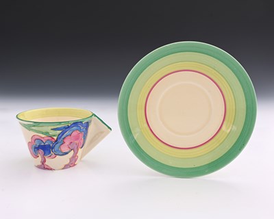 Lot 566b - Clarice Cliff, a Blue and Pink Trees cup and...