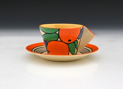 Lot 566c - Clarice Cliff, an Oranges tea cup and saucer,...