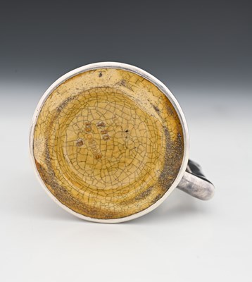 Lot 136 - A silver overlay ceramic tankard, J B Owens,...