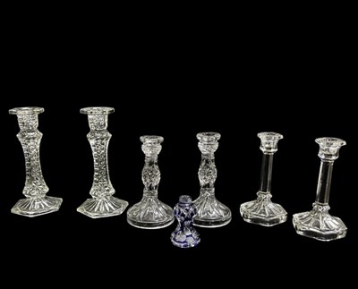 Lot 279 - An assortment of crystal glass candle stick...