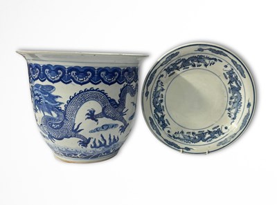 Lot 264 - A blue and white Chinese Dragon bowl (later...