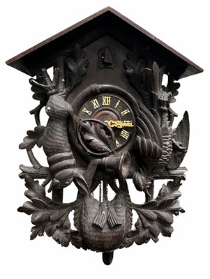 Lot 985 - A Black Forest cuckoo clock, early 20th...