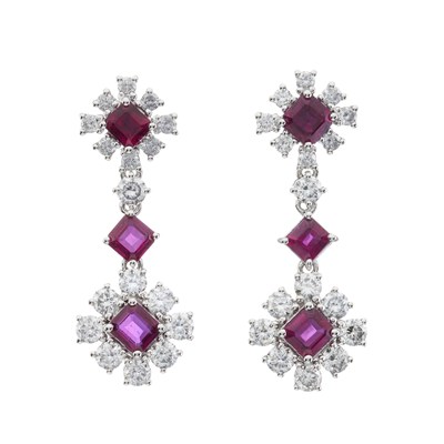 Lot 48 - A pair of 18ct gold ruby and diamond drop earrings