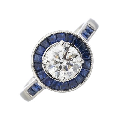 Lot 168 - An 18ct gold diamond and sapphire cluster dress ring