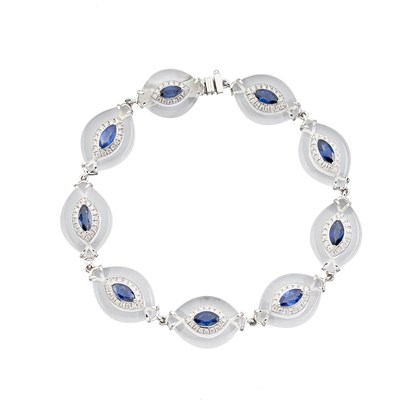 Lot 166 - A platinum rock crystal, sapphire and diamond cluster line bracelet