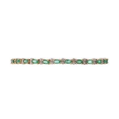 Lot 185 - A 14ct gold emerald and diamond line bracelet